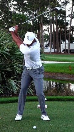 Tiger Woods at the top of the backswing - quiet hips, loaded